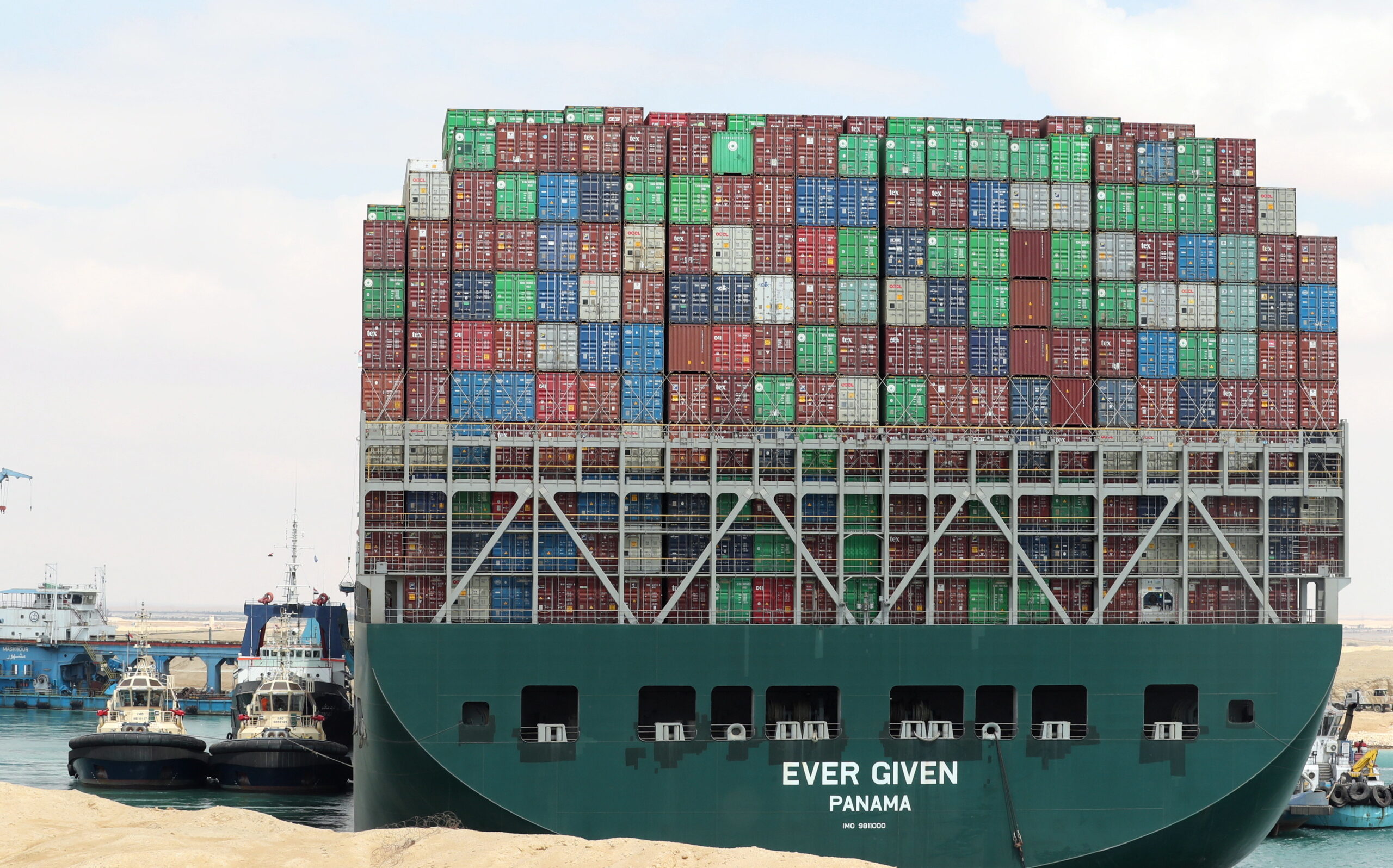 Suez Canal blocked as container ship runs aground