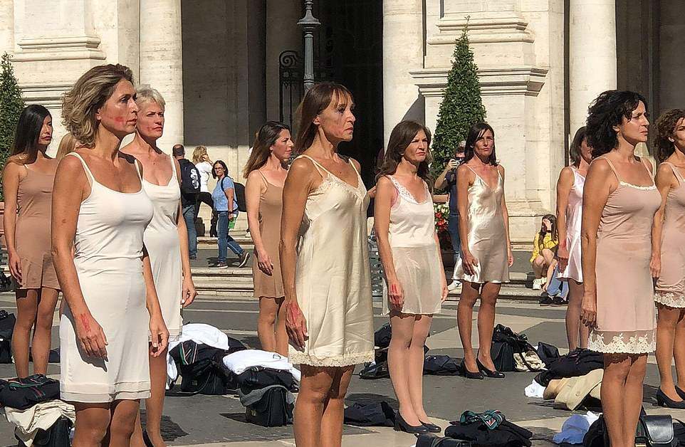 Dozens of stewardesses undressed right in the center of Italy in protest (Photo)