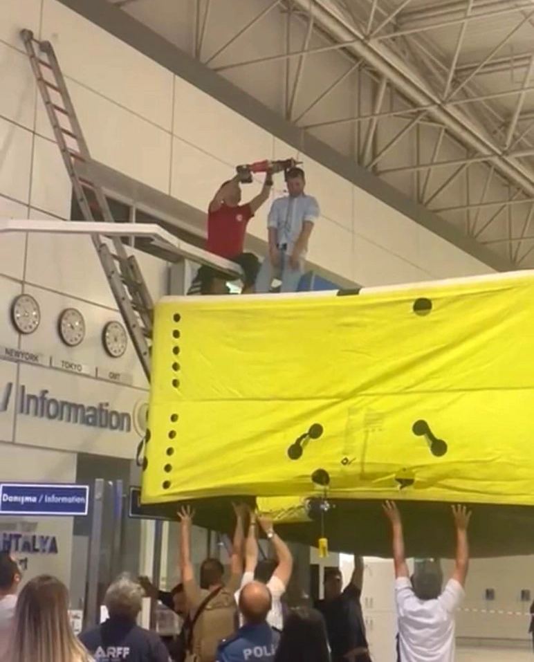 A Russian tourist hanged himself at the Antalya airport in front of a crowd of passengers