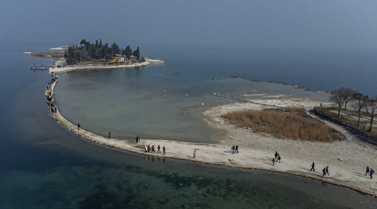 Winter drought in Italy has opened a hidden path to one of the islands on the famous Lake Garda