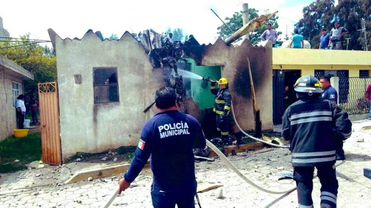 Private plane crashes into residential buildings in Mexico